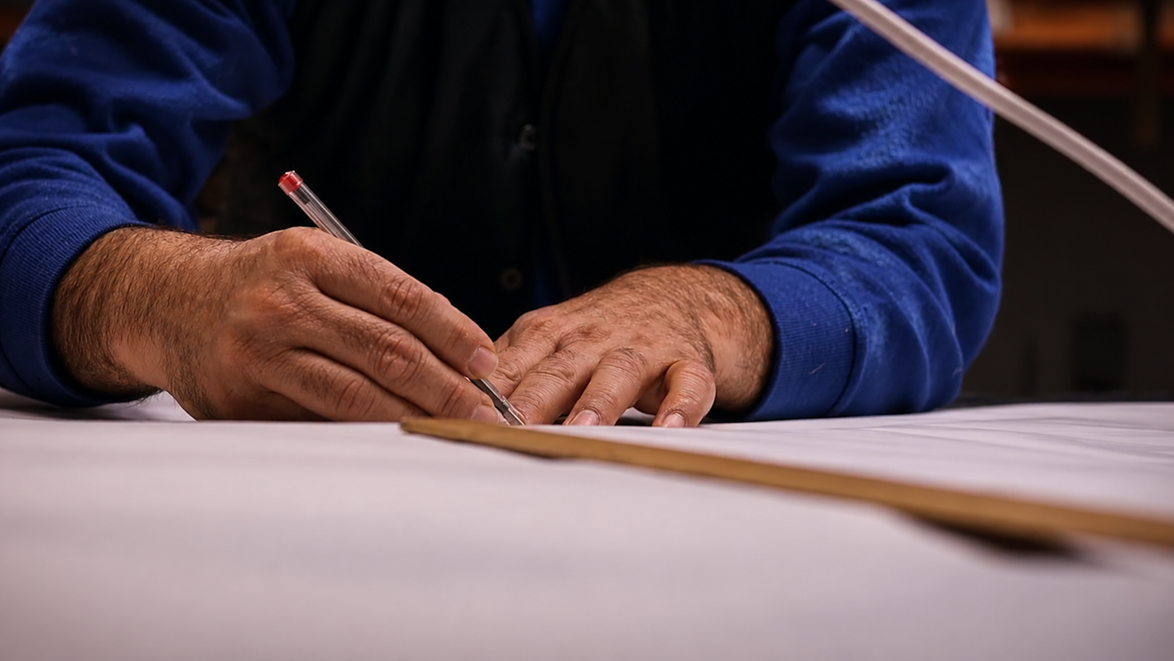 Pattern being marked by hand during the John Partridge parka film